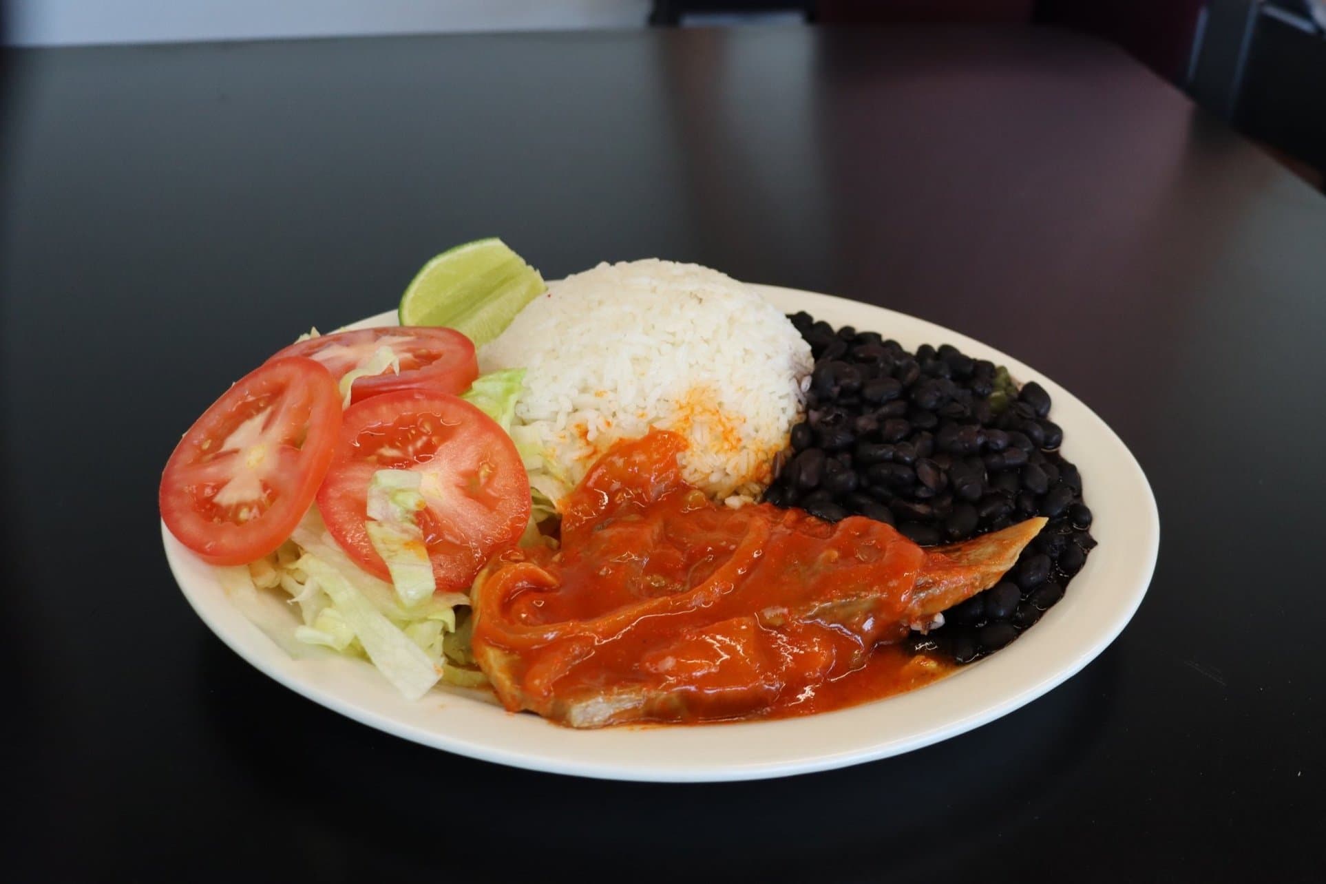 Another La Estrella entrée served with rice, beans and salad